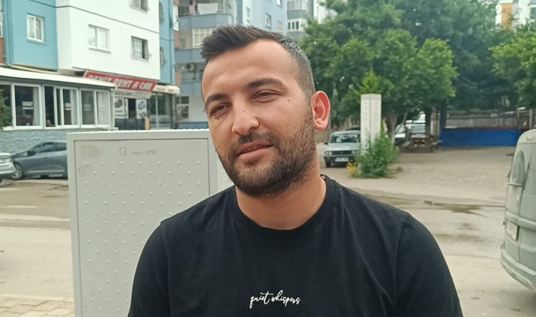 ADANA (AA) – Adana'nın Kozan ilçesinde apartman bahçesinde köpeğin bir